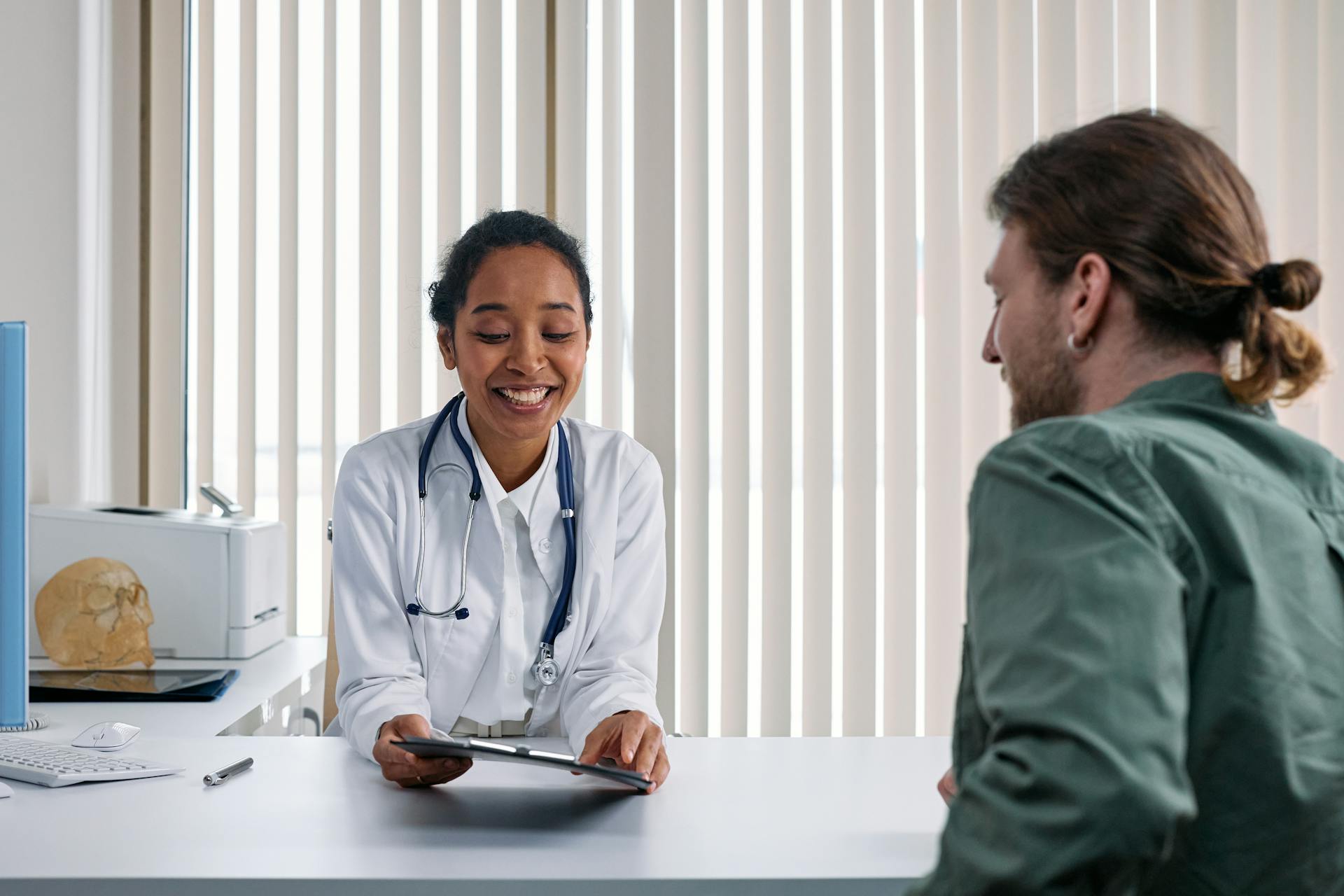 A clinician reviewing hormone lab results with a patient at OC Weight Loss and Med Spa in Mission Viejo